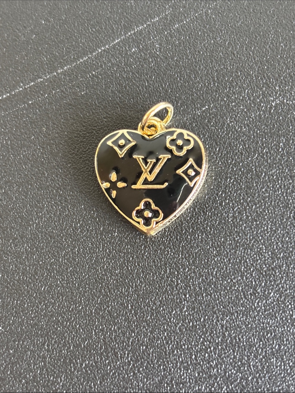 Louis Vuitton heart charm pull
